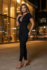 Mono Reductor Largo Bella Negro con Escote Trenzado y Cremallera en la Espalda