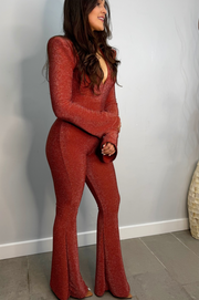 Zoe Mono Terracota acampanado con Escote V profundo