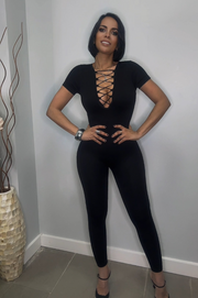 Mono Reductor Largo Bella Negro con Escote Trenzado y Cremallera en la Espalda