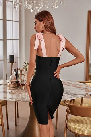 Image of Vestido Bandage Marleny negro con lazo en los hombros rosa